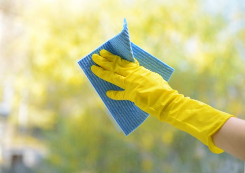 Carpet cleaner in TW1 using safety equipment during a carpet cleaning job