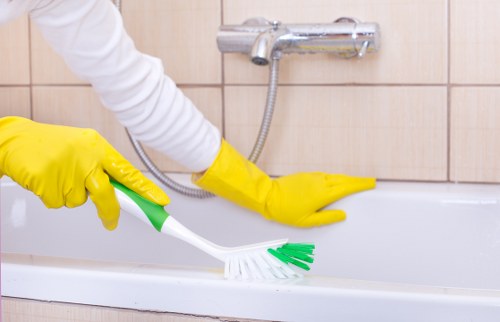 Local TW1 cleaning team handling post-construction dust removal