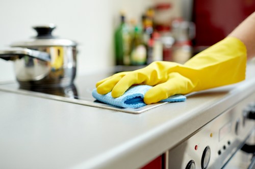 Detailed kitchen cleaning during a move-out service in TW1