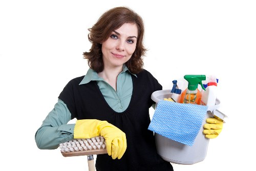 Local cleaner preparing a furnished rental property in TW1